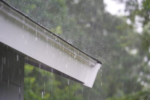 Leaky rain gutter during rain by Bryan Exteriors